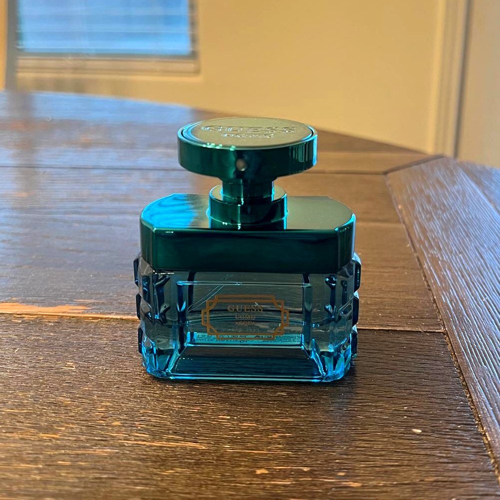 4 TJ Maxx Perfume Finds I Actually Own: Honest His & Hers Review Guess Uomo Acqua cologne, teal glass bottle