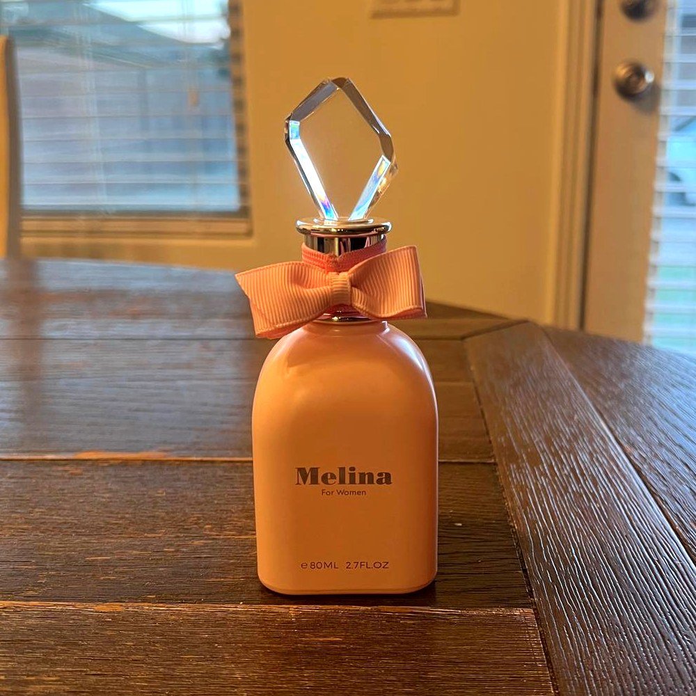 4 TJ Maxx Perfume Finds I Actually Own: Honest His & Hers Review Melina For Women eau de parfum, pink bottle with a bow